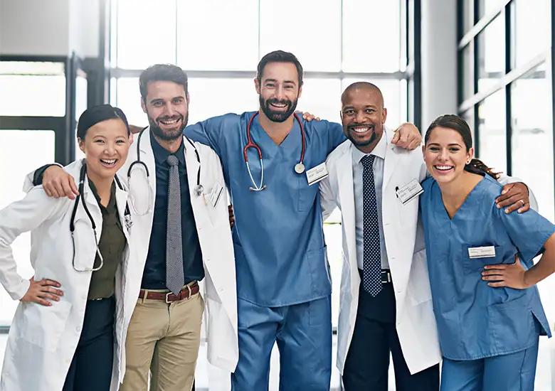 portrait of a team of doctors working together in hospital